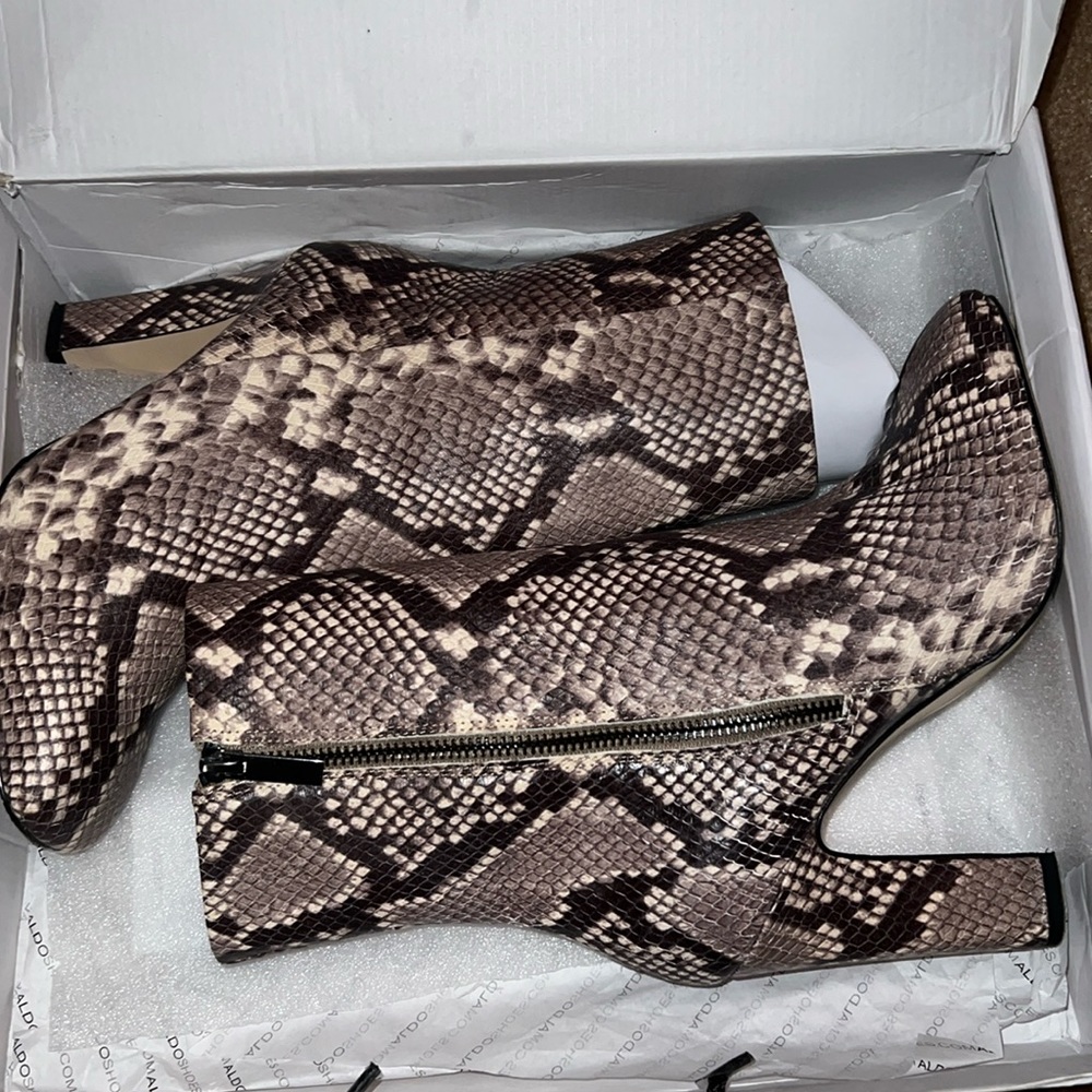 Snakes skin boots